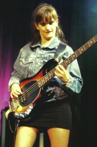 Tracy playing guitar